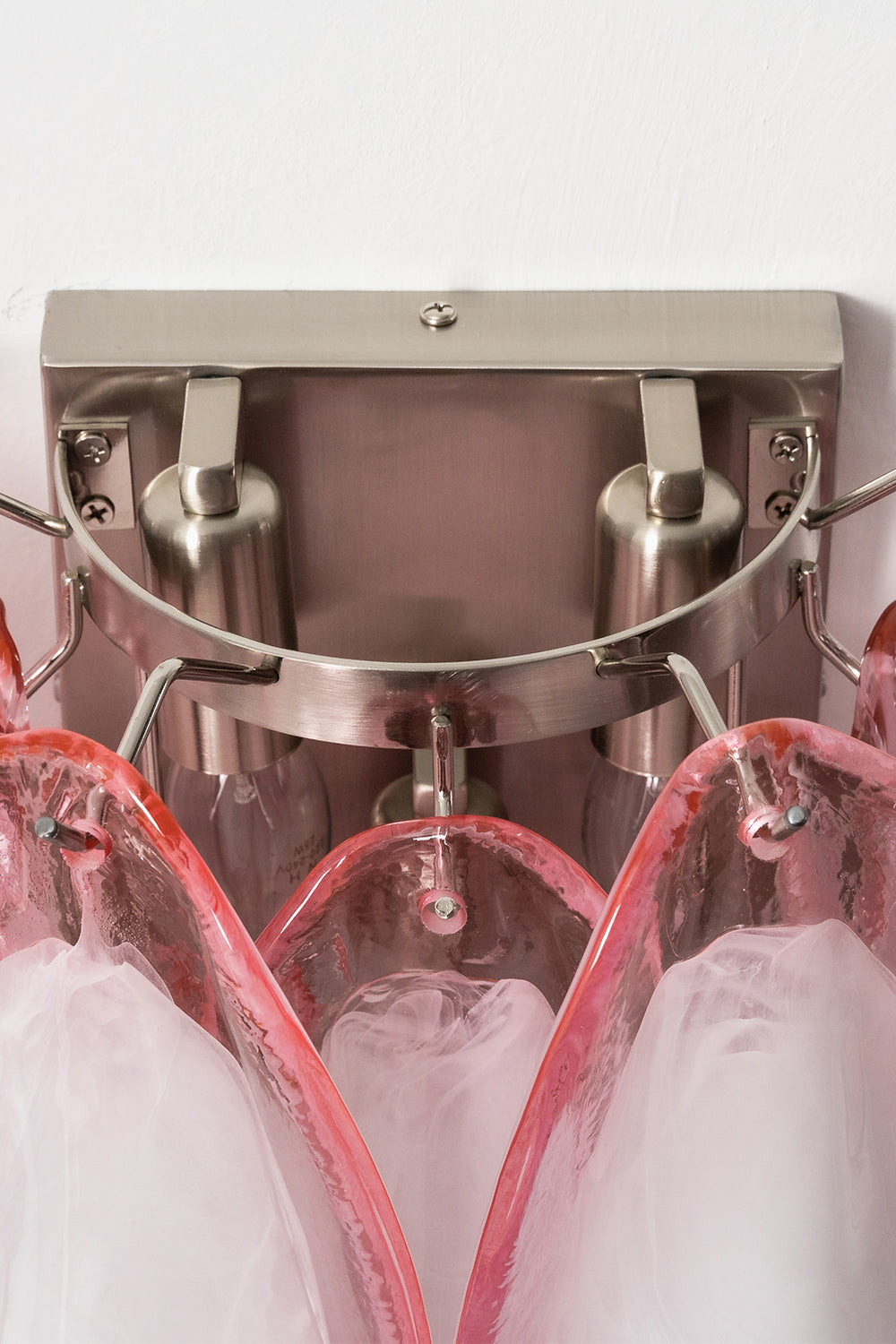 Elysian Bloom Glass Wall Lamp | Metal, Glass | Close-up of the internal chrome metal frame, sockets, and mounting plate | Detail shot | vexa lamps
