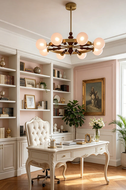 Pink glass globe chandelier in a classic white home office | Metal, Glass, Wood | Interior scene with bookshelves and a white desk | vexa lamps