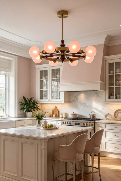 Elysian Circlet Chandelier in a modern classic kitchen | Metal, Glass, Wood | Installed over a marble island with pink stools | vexa lamps