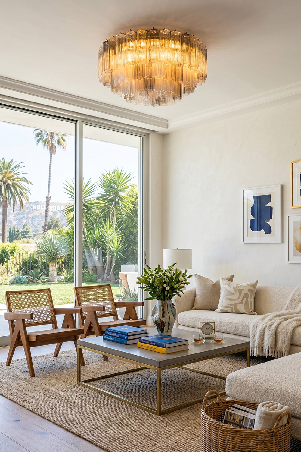 Elysian Tiered Fluted Ceiling Light | Glass, Metal | Providing a warm ambient halo in a bright modern living room with cream sofas and large sliding glass patio doors | vexa lamps