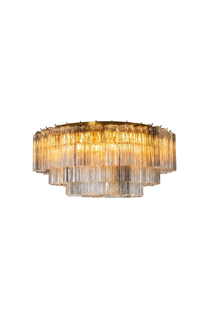 Elysian Tiered Fluted Ceiling Light | Glass, Metal | Multi-tiered concentric crystal flush mount ceiling lamp featuring vertical fluted ribbed glass rods and a gold metal frame | Isolated lit product shot on white background | vexa lamps