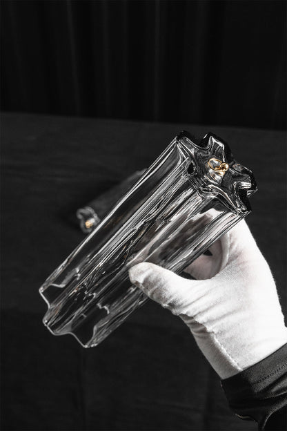 Elysian Tiered Fluted Ceiling Light | Glass, Metal | A gloved hand holding a single molded rectangular wave-shaped clear glass rod component to demonstrate its profile and size | Detail shot | vexa lamps