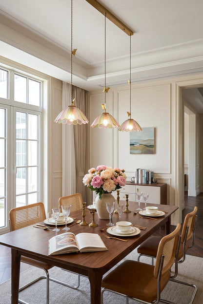 Faye Pastel Scalloped Glass Pendant Lamp | Glass, Metal | Multi-light linear pendant suspended above a dark wood dining table with elegant chairs and floral decor | vexa lamps