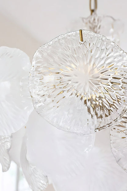 Close-up of the Fiore Radiance Glass Disc Chandelier showcasing elegant hand-finished glass discs.