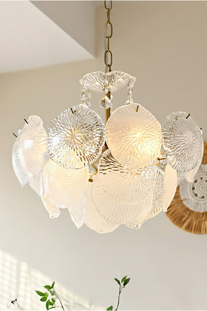 Fiore Radiance Glass Disc Chandelier with cascading glass discs and warm illumination in a modern space.