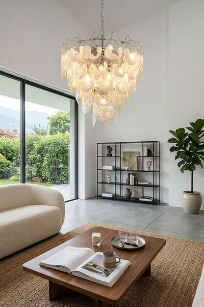 Modern glass leaf chandelier in a spacious living room | Metal, Glass | Bright interior with large sliding glass doors | vexa lamps