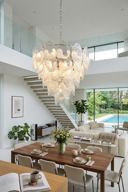 Frostelle glass leaf pendant in a modern open-plan home | Metal, Glass | View from the staircase showing living and dining areas | vexa lamps