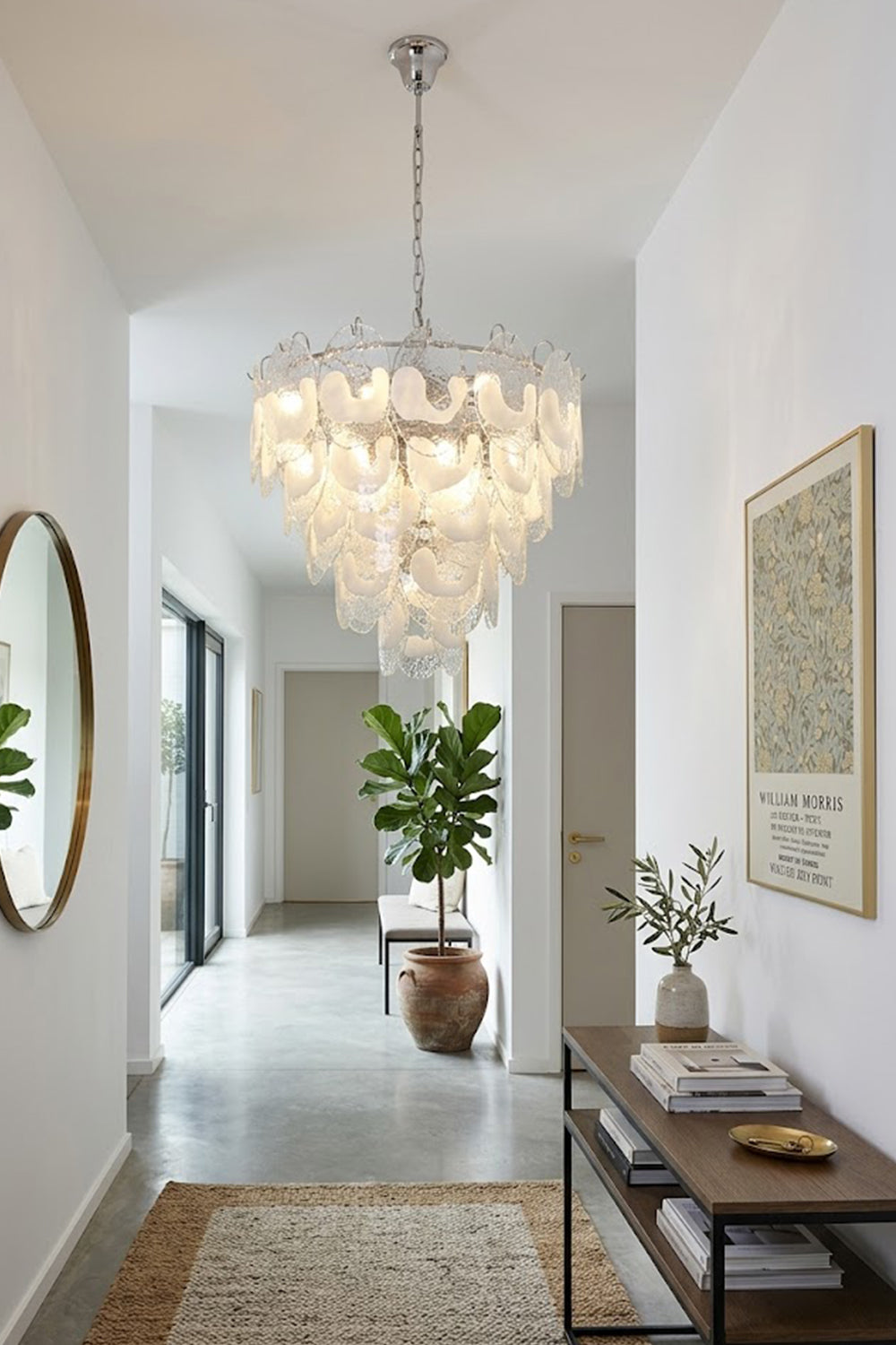Elegant glass art chandelier at the end of a corridor | Metal, Glass | Installed over a console table in a bright hallway | vexa lamps