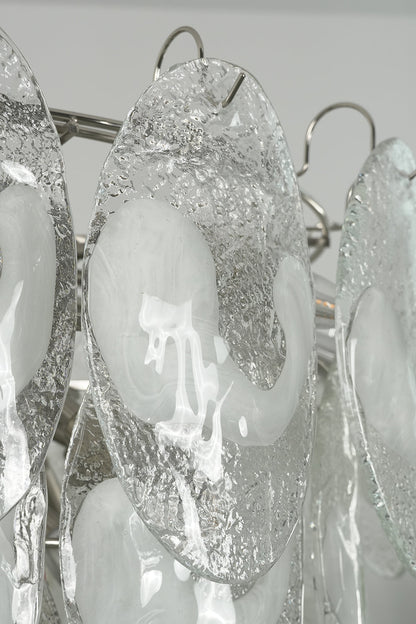 Detailed view of unlit textured glass leaves | Glass | Close-up showing the organic pattern of the Frostelle art chandelier | vexa lamps