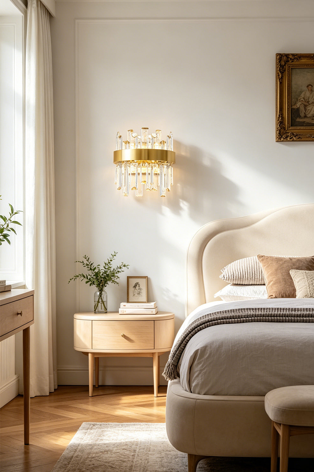 Glacia Tiered Crystal Statement Wall Lamp | Crystal, Metal | Mounted as an elegant bedside reading sconce casting a warm ambient glow above a light wood nightstand in a bright contemporary bedroom | vexa lamps