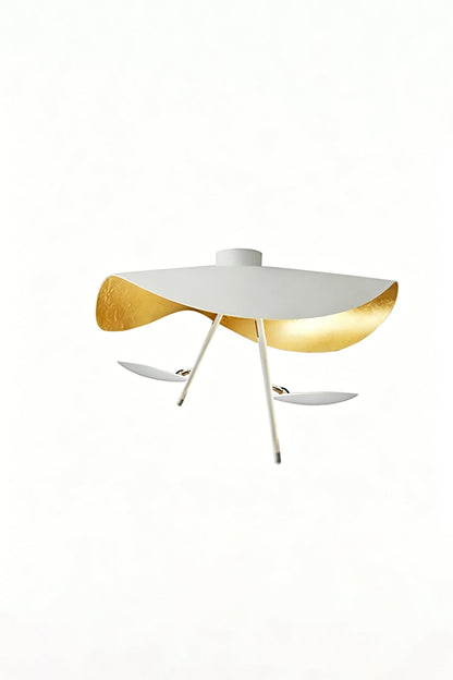 Gold-Tone Sculptural Ceiling Light featuring a wave-like design in matte white and crinkled gold finish.