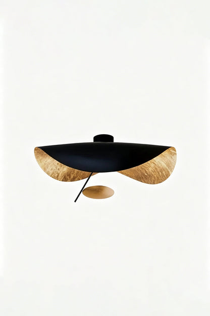 Gold-Tone Sculptural Ceiling Light featuring a wave-like design in matte black and crinkled gold finish.