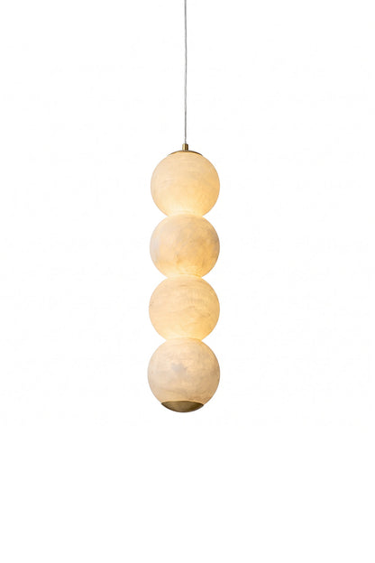 Imperial Epoch Alabaster Pendant Lamp | Metal, Alabaster | Four stacked glowing alabaster spheres with brass accents | Isolated lit product shot on white background | vexa lamps