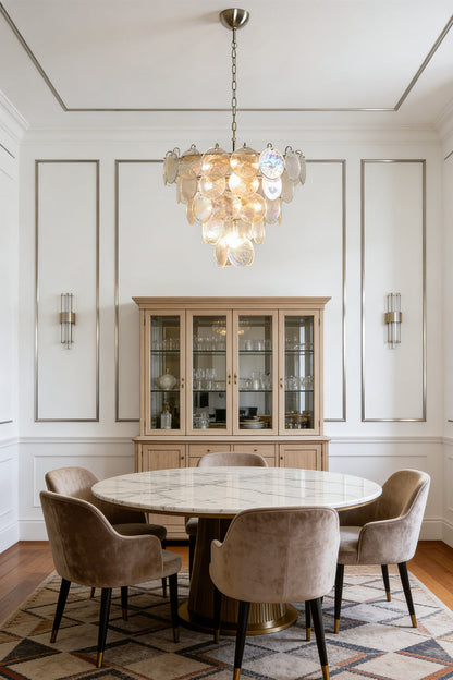 Round iridescent glass chandelier | Metal, Glass | Installed over a dining table with neutral chairs | vexa lamps