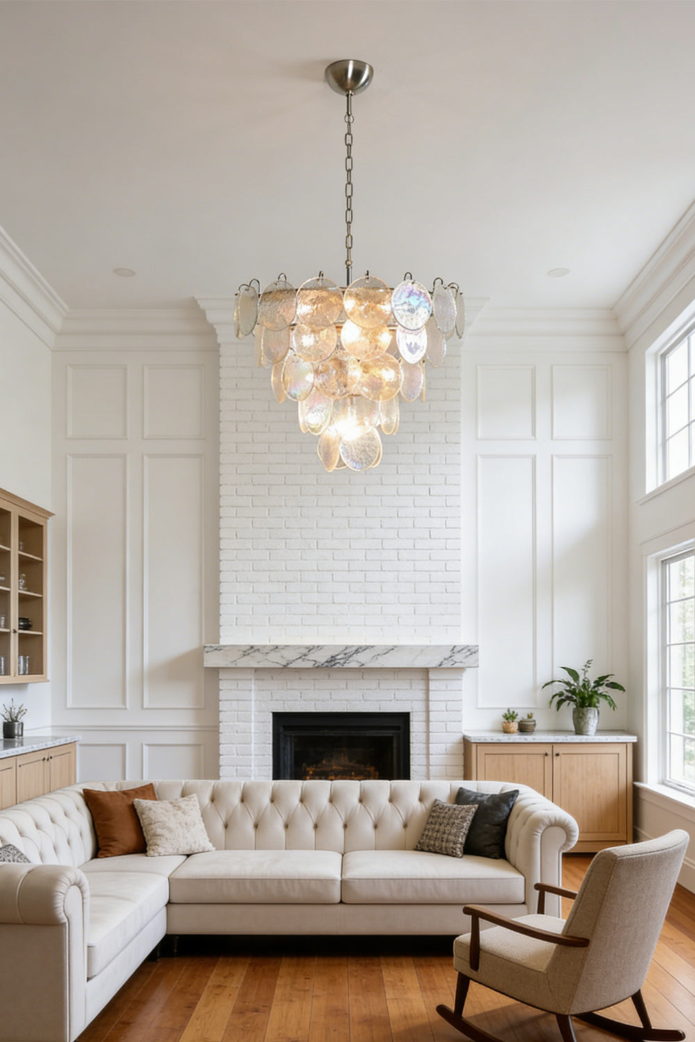 Elegant glass disc chandelier | Metal, Glass | Hanging in a bright living room with white sofa | vexa lamps