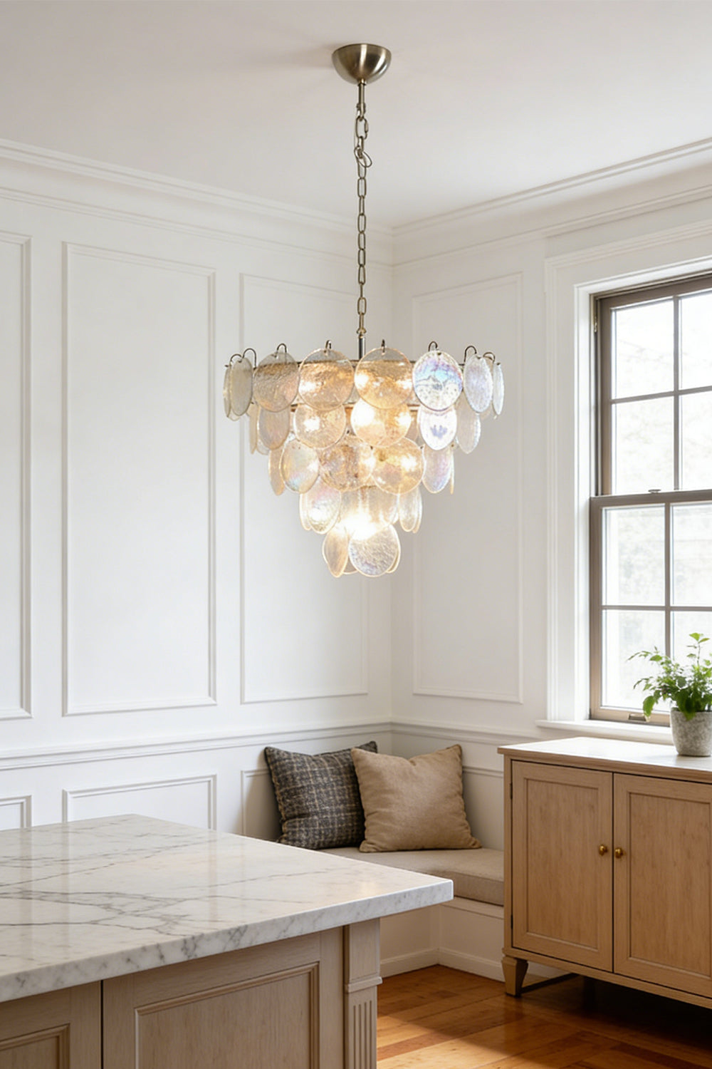 Shimmering glass disc chandelier | Metal, Glass | Hanging in a bright kitchen breakfast nook | vexa lamps