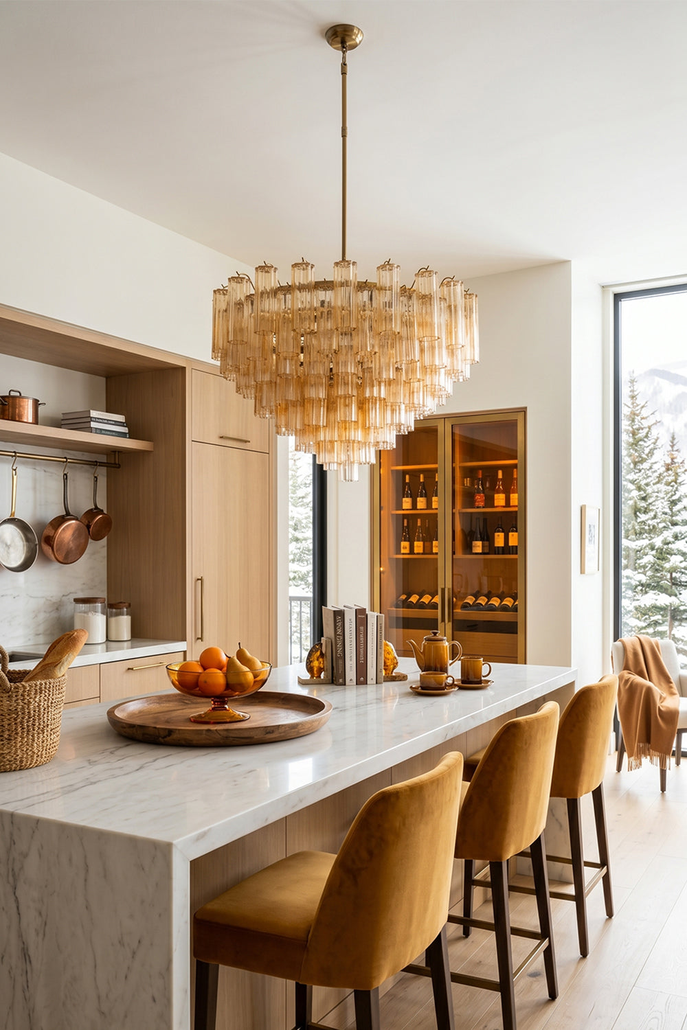Isadora Tiered Amber Glass Chandelier illuminating a stylish kitchen with warm ambiance and elegant decor.