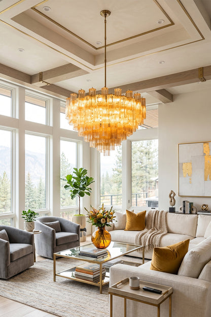 Luxurious living room featuring an Isadora Tiered Amber Glass Chandelier illuminating the elegant space.