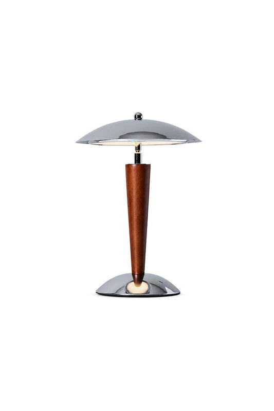 Isolde Domed Walnut Table Lamp | Walnut Wood, Chrome | Isolated unlit view of a modern mid-century mushroom-shaped table lamp featuring a polished chrome dome shade, tapered walnut wood stem, and a round metallic base | White background | vexa lamps
