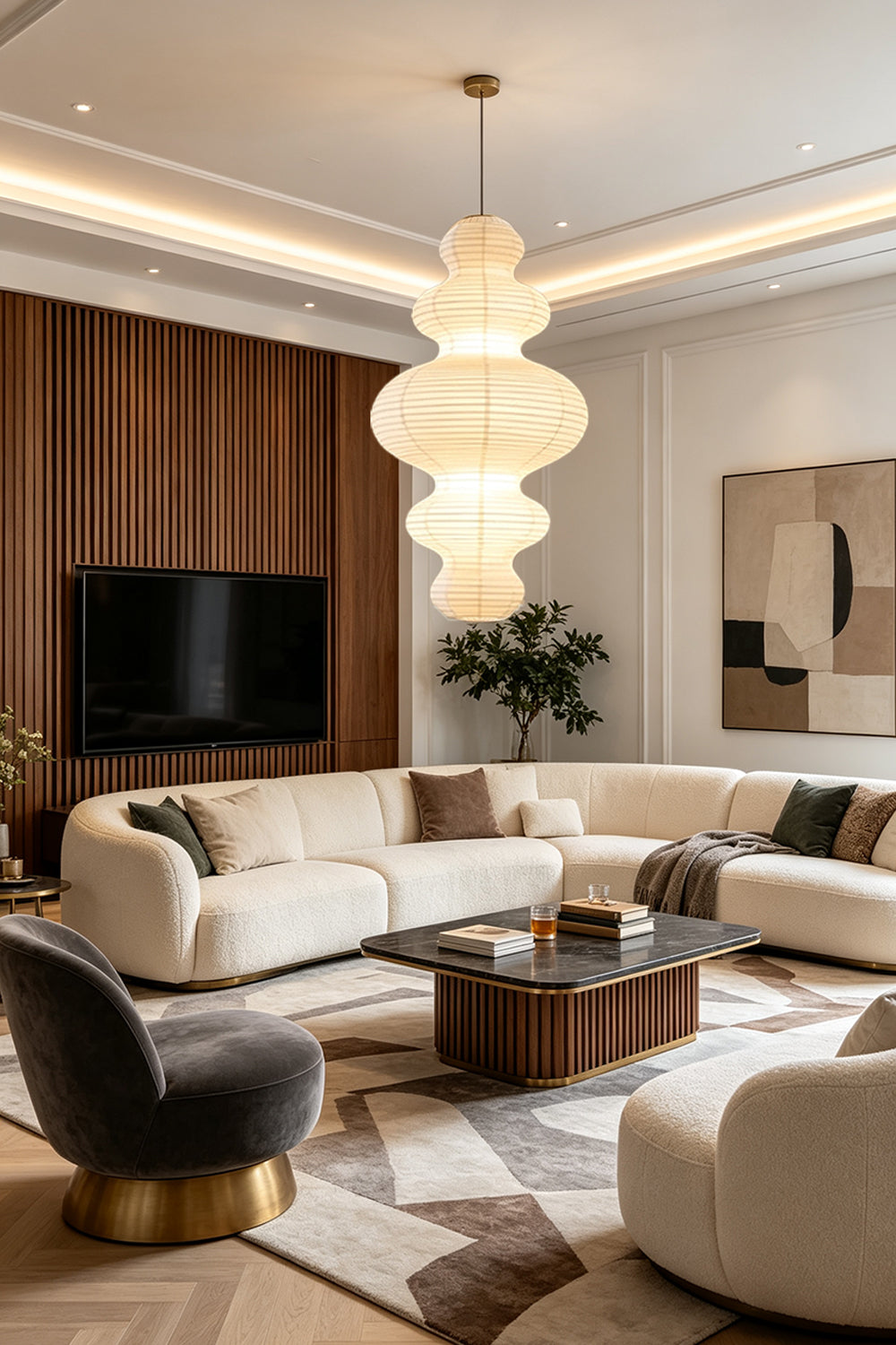 Isolde Stacked Paper Pendant Lamp | Textured Ribbed Paper | Adding a warm glow to a spacious modern living room with a large cream sofa and coffee table | vexa lamps