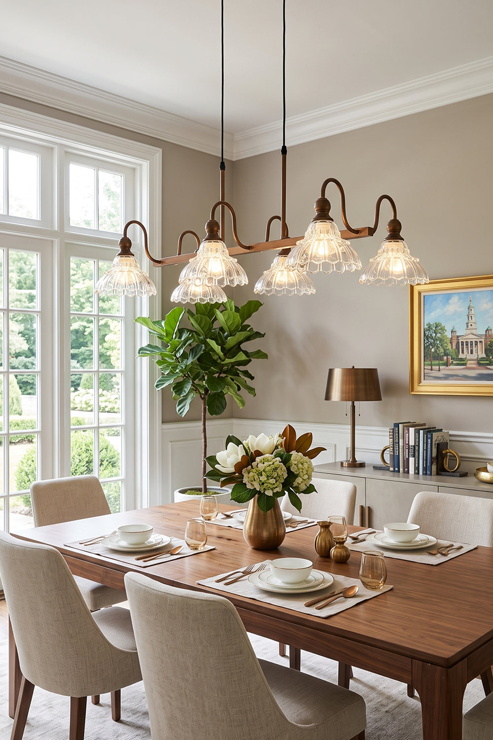 Isolde Vintage Glass Long Chandelier | Linear Dining Light | Hanging elegantly as a classic centerpiece over a rich rectangular wood dining table paired with neutral upholstered chairs in a sunlit room | vexa lamps