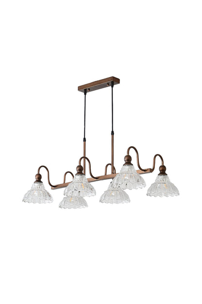 Isolde Vintage Glass Long Chandelier | Textured Glass, Bronze | Isolated lit view of a traditional vintage-style multi-light linear island chandelier featuring ruffled scalloped clear glass shades on an elegant dark bronze linear frame with curved arms | White background | vexa lamps