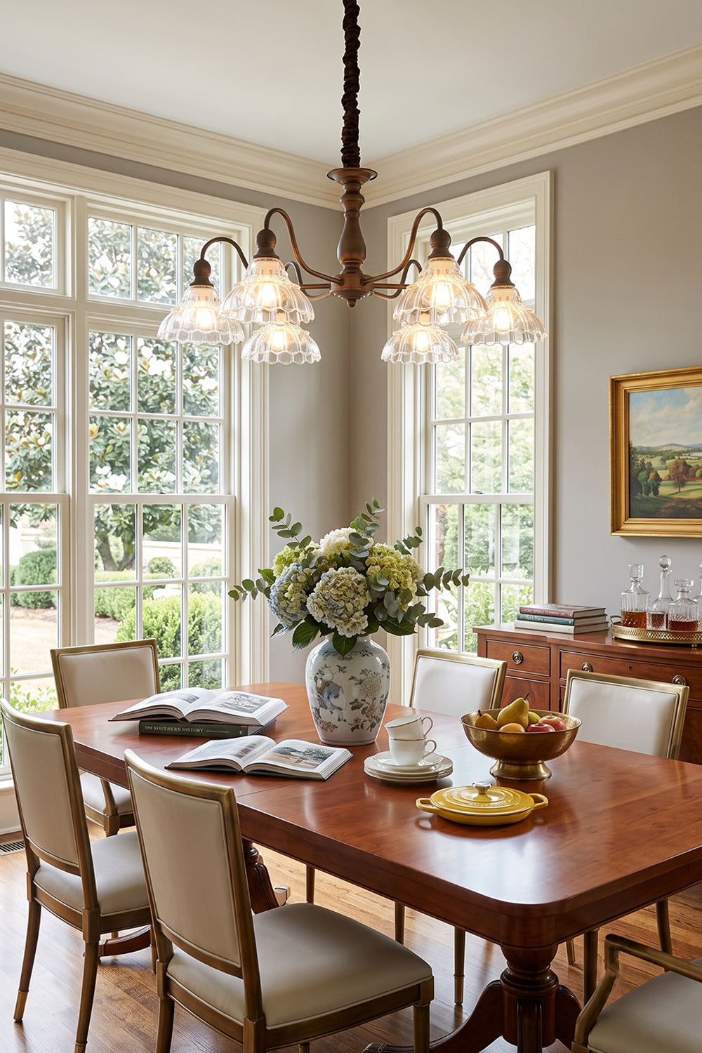 Isolde Vintage Scalloped Glass Chandelier | Dining Room Chandelier | Suspended beautifully above a long solid wood dining table paired with elegant neutral upholstered chairs | vexa lamps