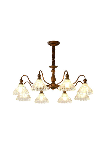 Isolde Vintage Scalloped Glass Chandelier | Textured Glass, Bronze | Isolated lit view of a traditional vintage-style multi-light chandelier featuring ruffled scalloped clear glass shades on an elegant dark bronze curved frame | White background | vexa lamps