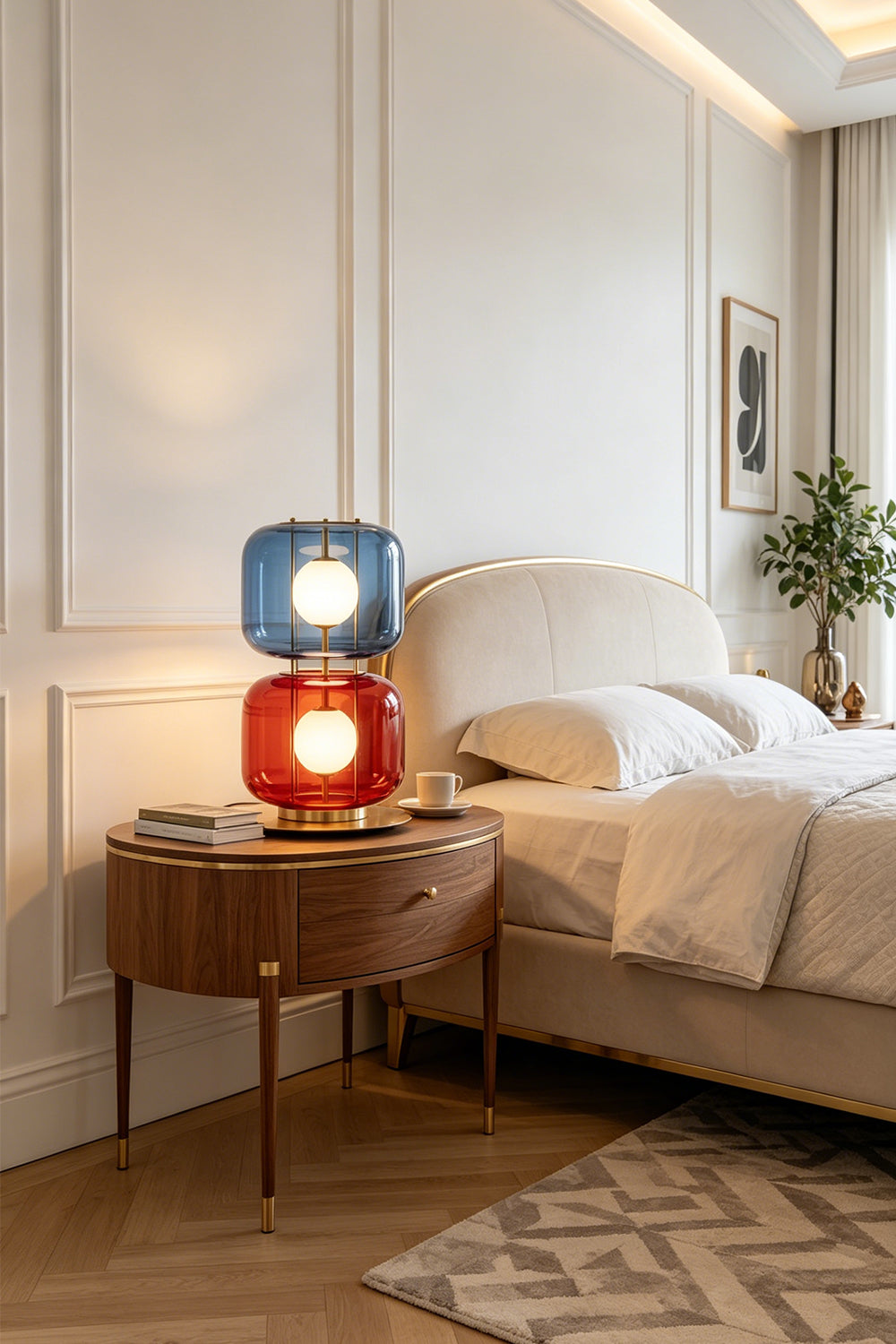 Jasper Colorblock Table Lamp | Glass, Metal | Set as an eye-catching bedside light on a wooden nightstand next to a cream platform bed in a serene modern bedroom | vexa lamps