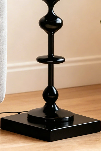 Kira Beaded Mushroom Floor Lamp | Metal, Glossy Finish | Detailed close-up of the square black base and the bottom glossy spheres of the sculptural totem stem | vexa lamps