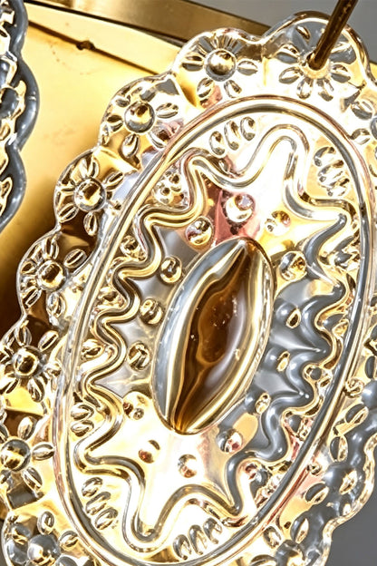 Lavinia Pressed Glass Tier Wall Sconce | Pressed Glass and Brass | Macro detail of the vintage floral texture on a single glass piece | vexa lamps