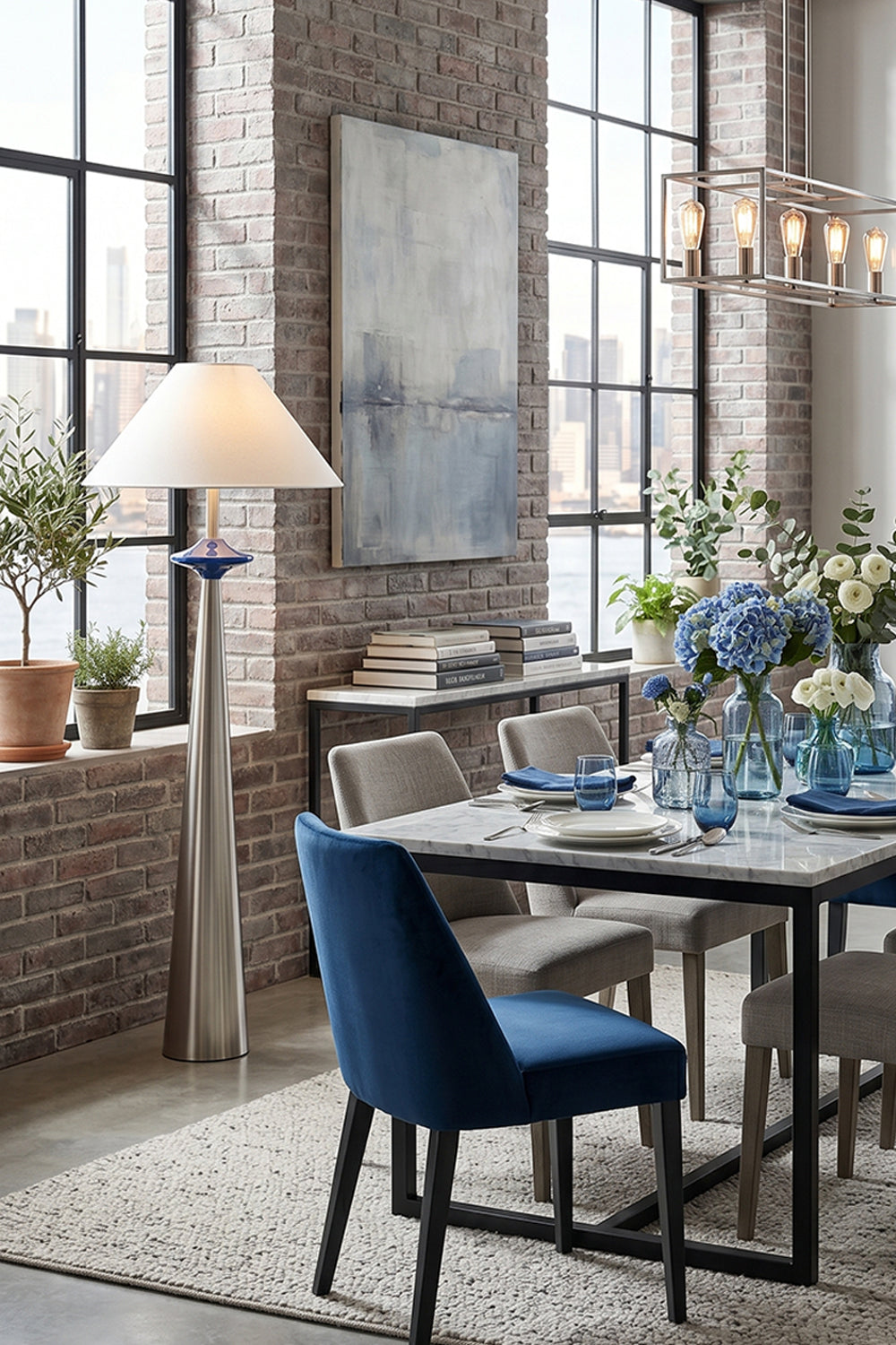 Lazuro Postmodern Cone Floor Light | Metal, Fabric | Illuminating a modern classical loft dining area, casting a warm ambient glow near a dining table setup with dark blue chairs | vexa lamps