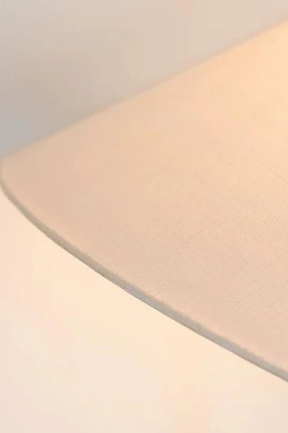 Lazuro Postmodern Cone Floor Light | Metal, Fabric | Detailed view from underneath the white linen cone lampshade showcasing the warm diffused glow and textured fabric weave | Detail shot | vexa lamps