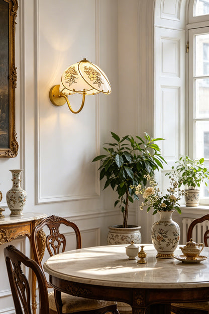 Lillian Retro Floral Wall Lamp | Glass, Metal | Wall-mounted in a traditional dining room, throwing a cozy light over a round wood table and chairs | vexa lamps