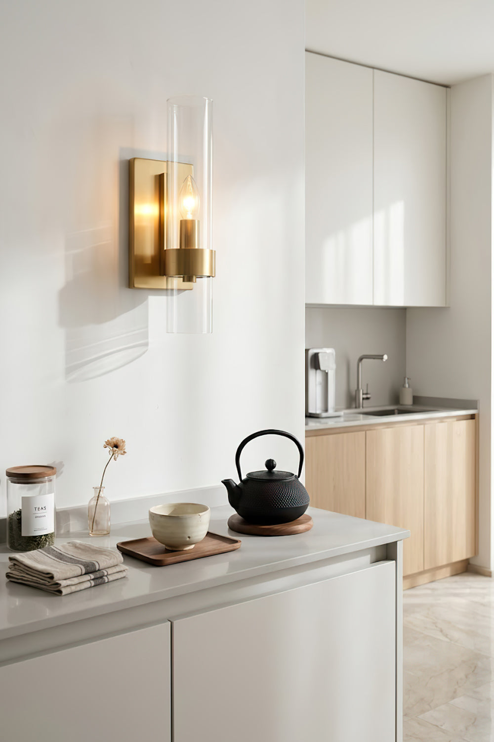 Modern linear brass wall light | Brass, Glass | Installed in a white kitchen setting | vexa lamps