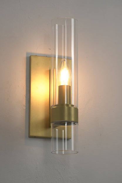 Lit brass linear wall lamp | Brass, Glass | Side perspective showing warm glow and glass texture | vexa lamps