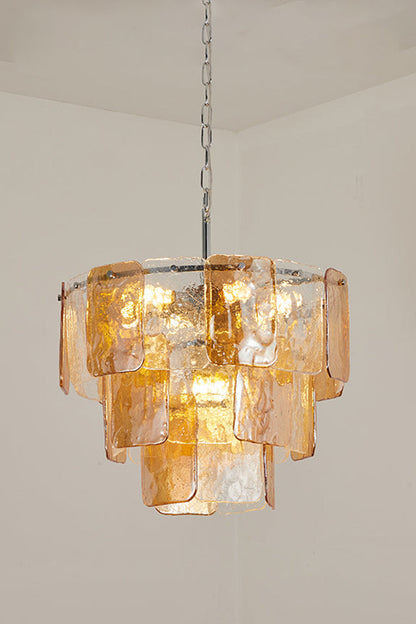 Lucia Tiered Amber Glass Chandelier | Glass, Metal | Studio view of a smaller three-tier variant fully lit against a plain off-white background | vexa lamps