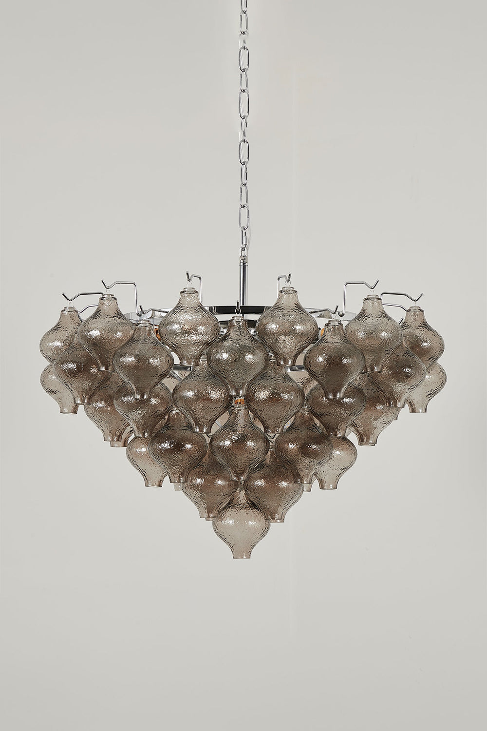 Lucina Tiered Smoked Glass Chandelier showcasing hand-blown glass components in smoky amber tint and polished chrome chain.