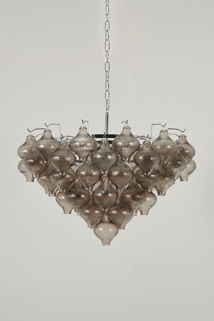 Lucina Tiered Smoked Glass Chandelier showcasing hand-blown glass components in smoky amber tint and polished chrome chain.