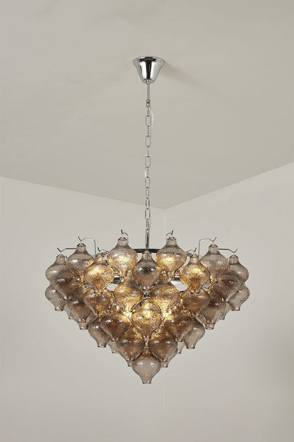 Lucina Tiered Smoked Glass Chandelier showcasing a stylish smoked glass design and polished chrome chain.