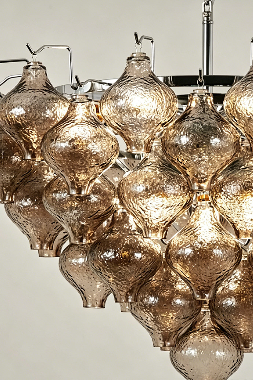 Lucina Tiered Smoked Glass Chandelier with hand-blown smoky amber glass components and polished chrome accents.