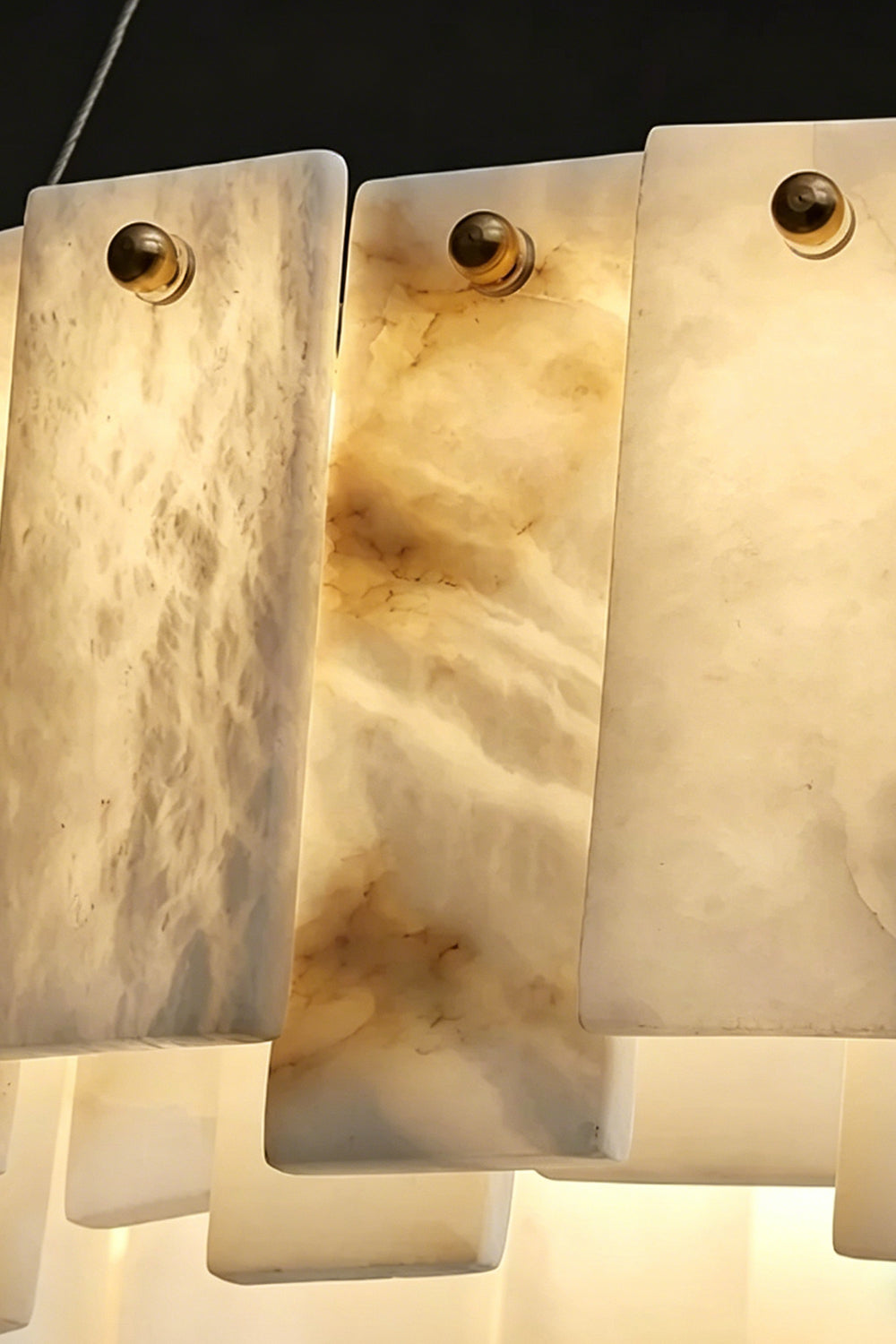 Chandelier Detail | Alabaster, Brass | Close-up of translucent alabaster slats and pins | vexa lamps