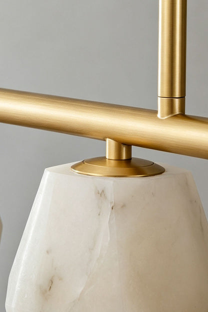 Manon Alabaster Drop Linear Chandelier | Natural Alabaster and Brass | Close-up view of the brass linear frame and alabaster shade connection | vexa lamps