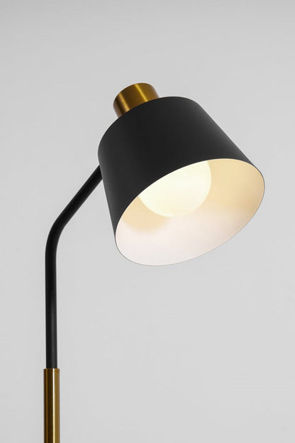 Marlowe Gooseneck Reading Floor Lamp | Matte Black and Brass | Focused shot of the illuminated lamp head providing directed task lighting | vexa lamps