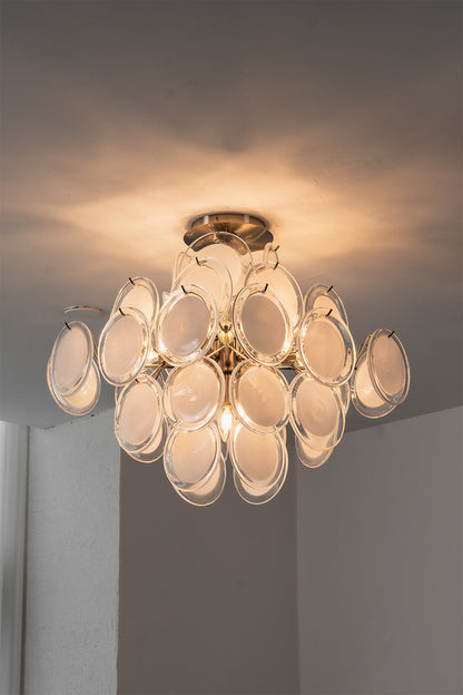 Mirella Circular Glass Pane Ceiling Light | Studio Lit View | Fully lit studio presentation of the circular glass pane fixture casting a warm golden light halo on a grey ceiling backdrop | vexa lamps