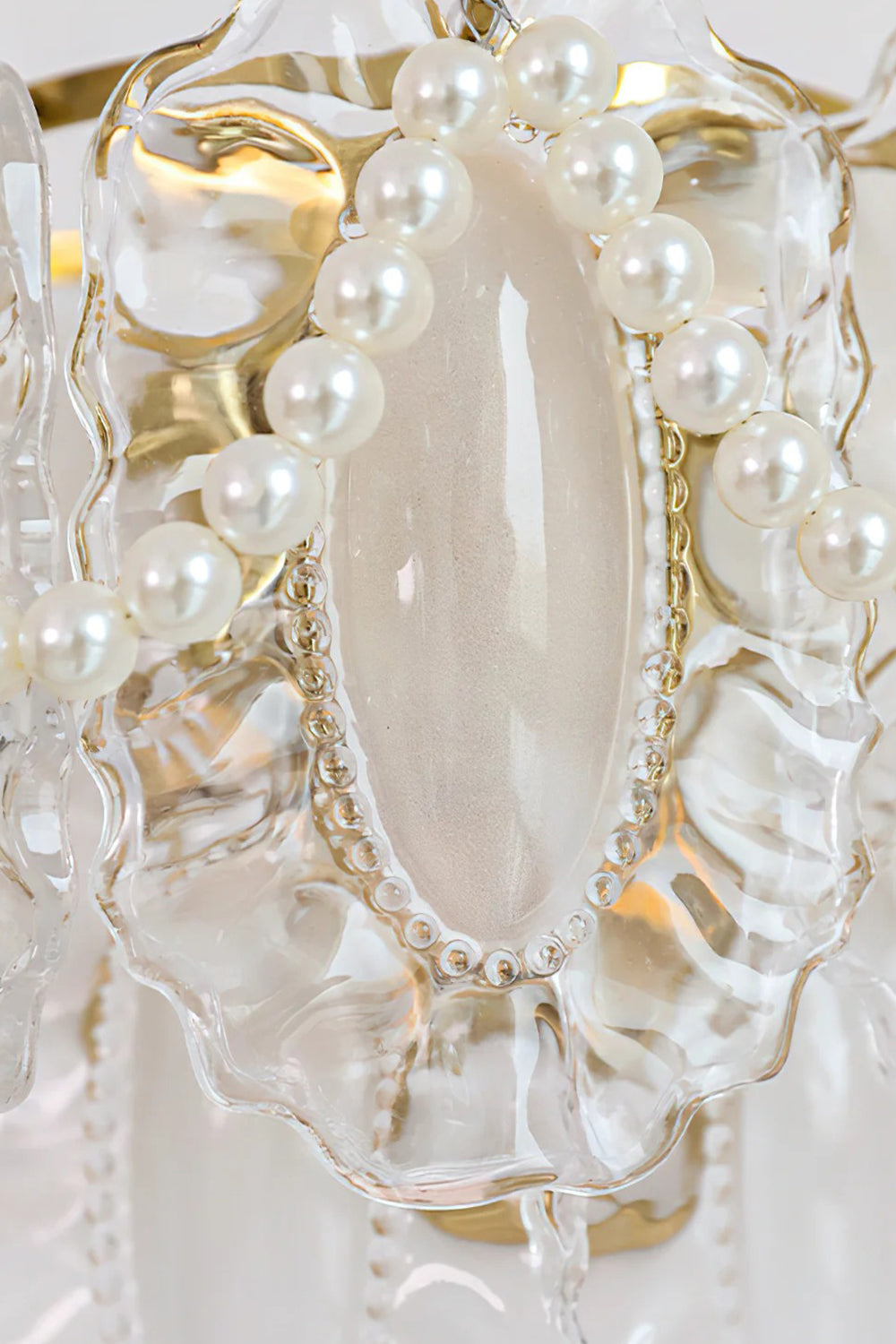Close-up of the Mirella Pearl and Glass Wall Lamp featuring ruffled glass and pearl accents.