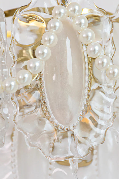 Close-up of the Mirella Pearl and Glass Wall Lamp featuring ruffled glass and pearl accents.