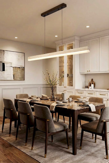 Linear travertine dining light over a long table | Travertine, Wood, Acrylic | Formal dining room interior with neutral chairs | vexa lamps