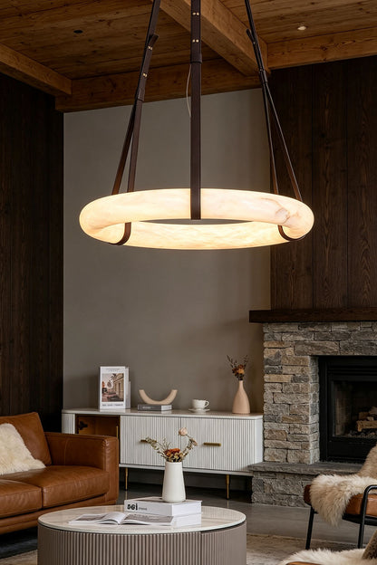 Nerissa Alabaster Ring Leather Pendant Light | Natural Alabaster, Leather and Brass | Large 3-strap ring variant in a rustic living room with dark ceiling | vexa lamps