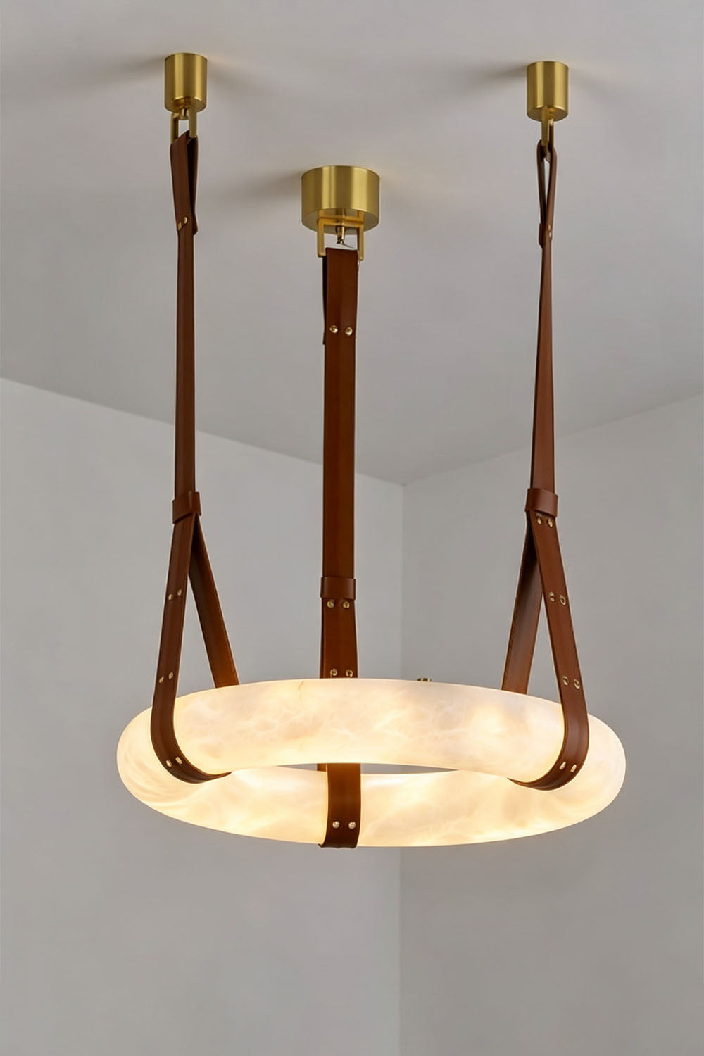 Nerissa Alabaster Ring Leather Pendant Light | Natural Alabaster, Leather and Brass | Full product view of 3-strap ring variant on a light grey backdrop | vexa lamps